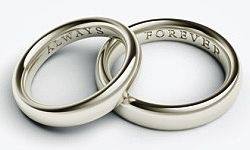 Two Golden wedding bands with inscription Forever Always