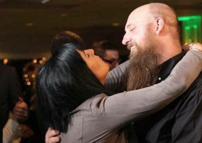Woman embracing man on dance floor