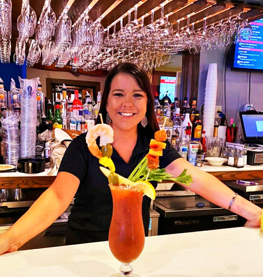 Bloody Mary with bartender in background