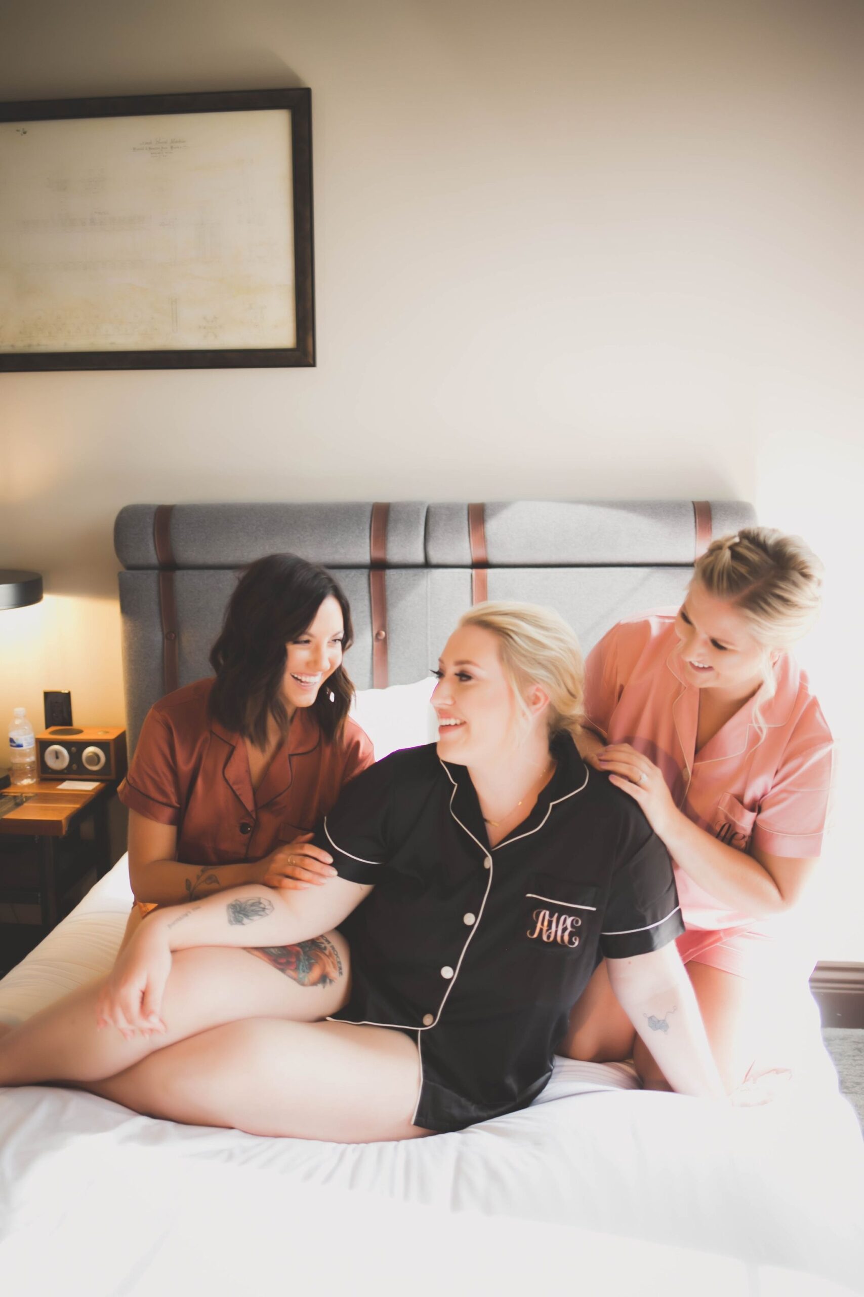 Bride getting ready on bed