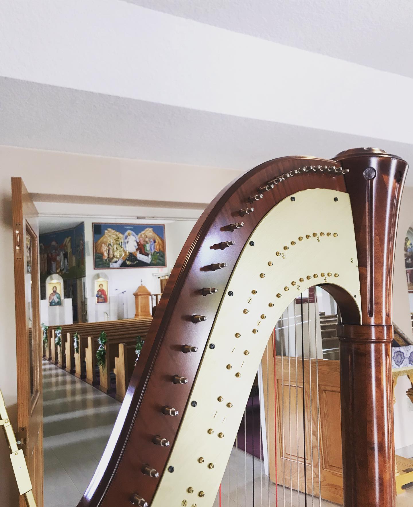 Harpist for hire in Fort Wayne Indiana Picture of Harpist view set up at a Church chapel for a Wedding